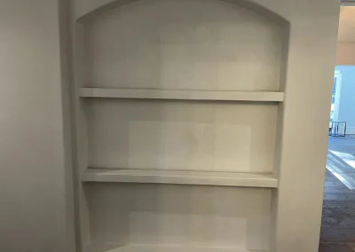 Newly plastered book shelf